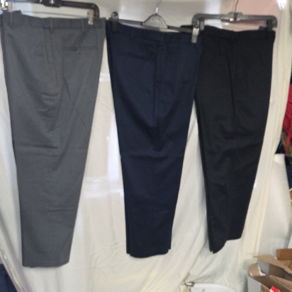 3 Pair Haggar dress pants. Available in charcoal, navy, and black. 36x29 - Picture 5 of 13